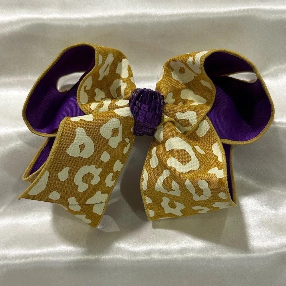 Hair Bow. Gold Leopard Print w/ Purple Center